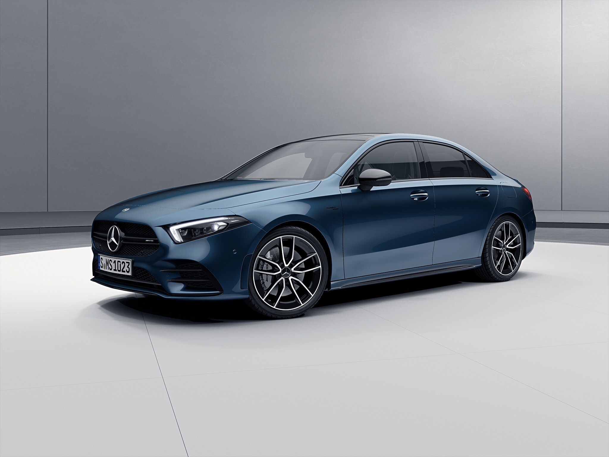The image shows the front of the Mercedes-AMG A 35 4MATIC from the side.