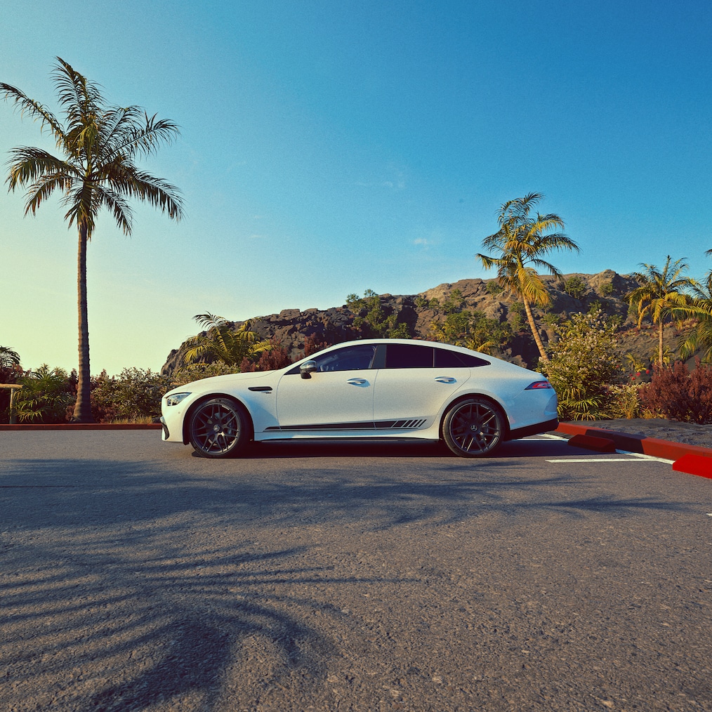 The active aerodynamics of the Mercedes-AMG GT 53 4MATIC+ (rear wing) or driving shot, seen from the rear end with extended rear wing.