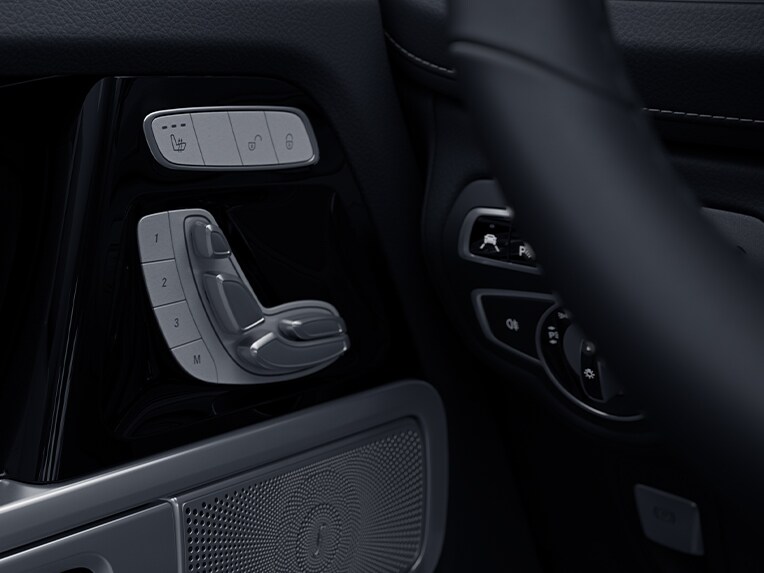 The controls for the seat adjustment of the front seats in the Mercedes-Benz G-Class.