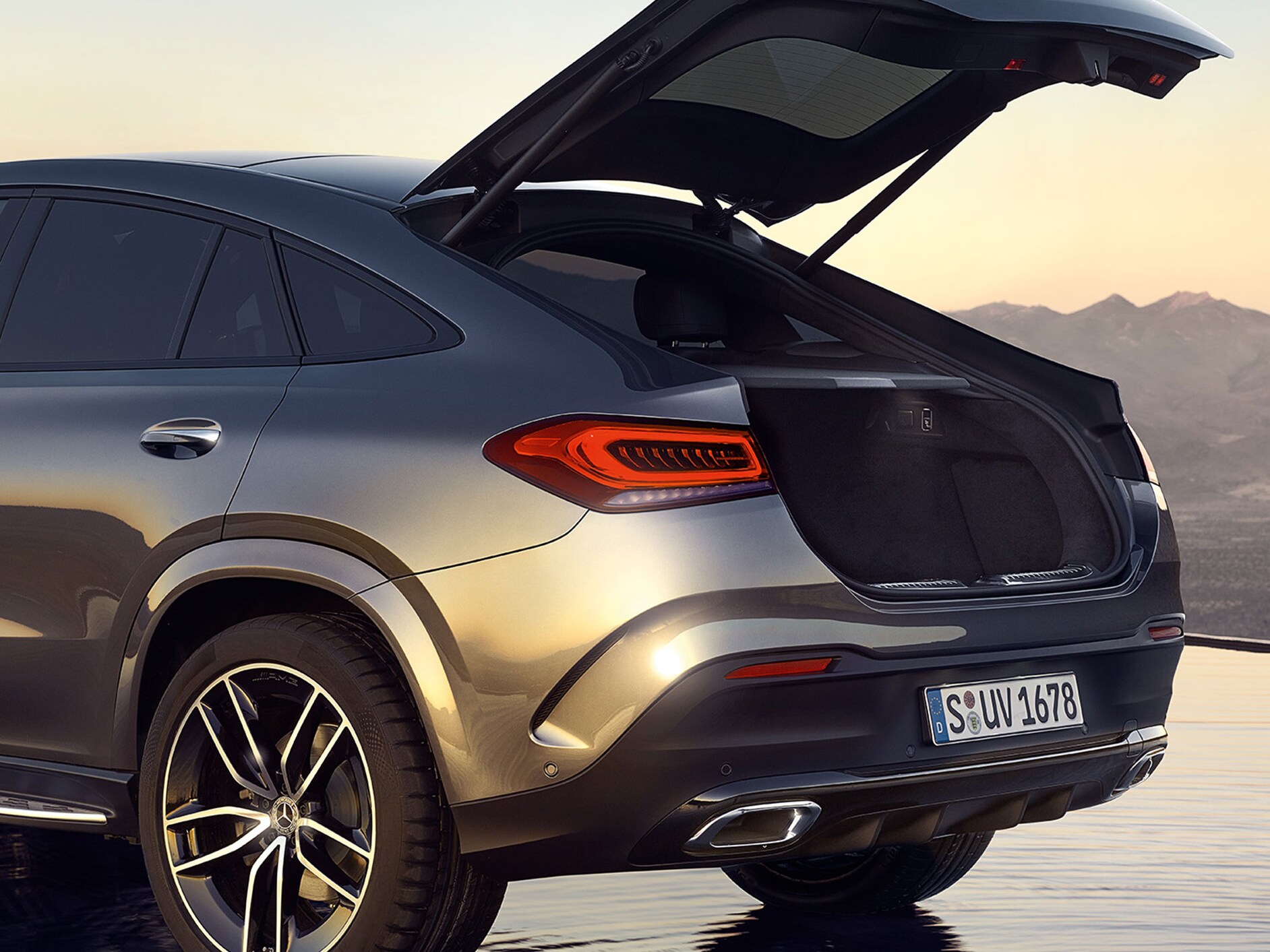 The rear view of the Mercedes-Benz GLE Coupé with the boot open.