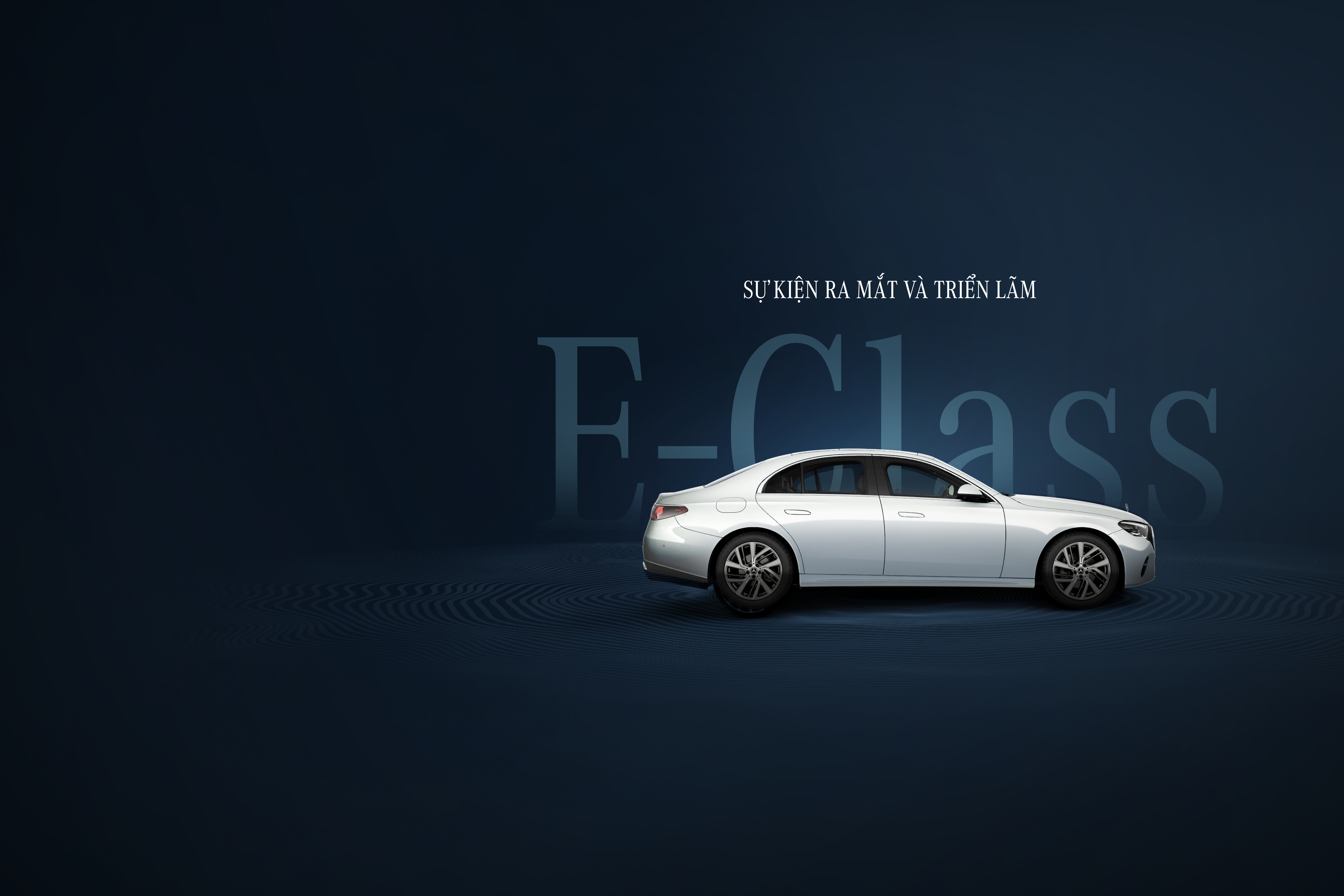 Ra mắt Mercedes-Benz E-Class Xe E-Class mới trên nền xanh sự kiện
