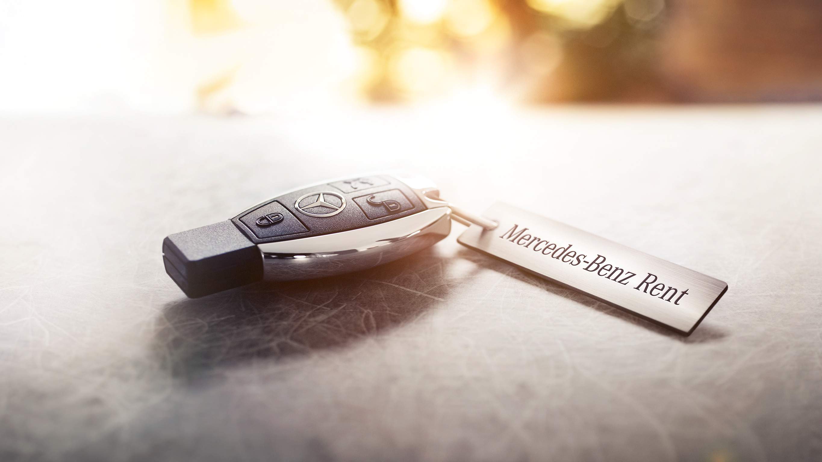 Exclusive privileges for corporates and key professional groups Close-up of a Mercedes-Benz car key – Exclusive privileges for corporates and key professional groups