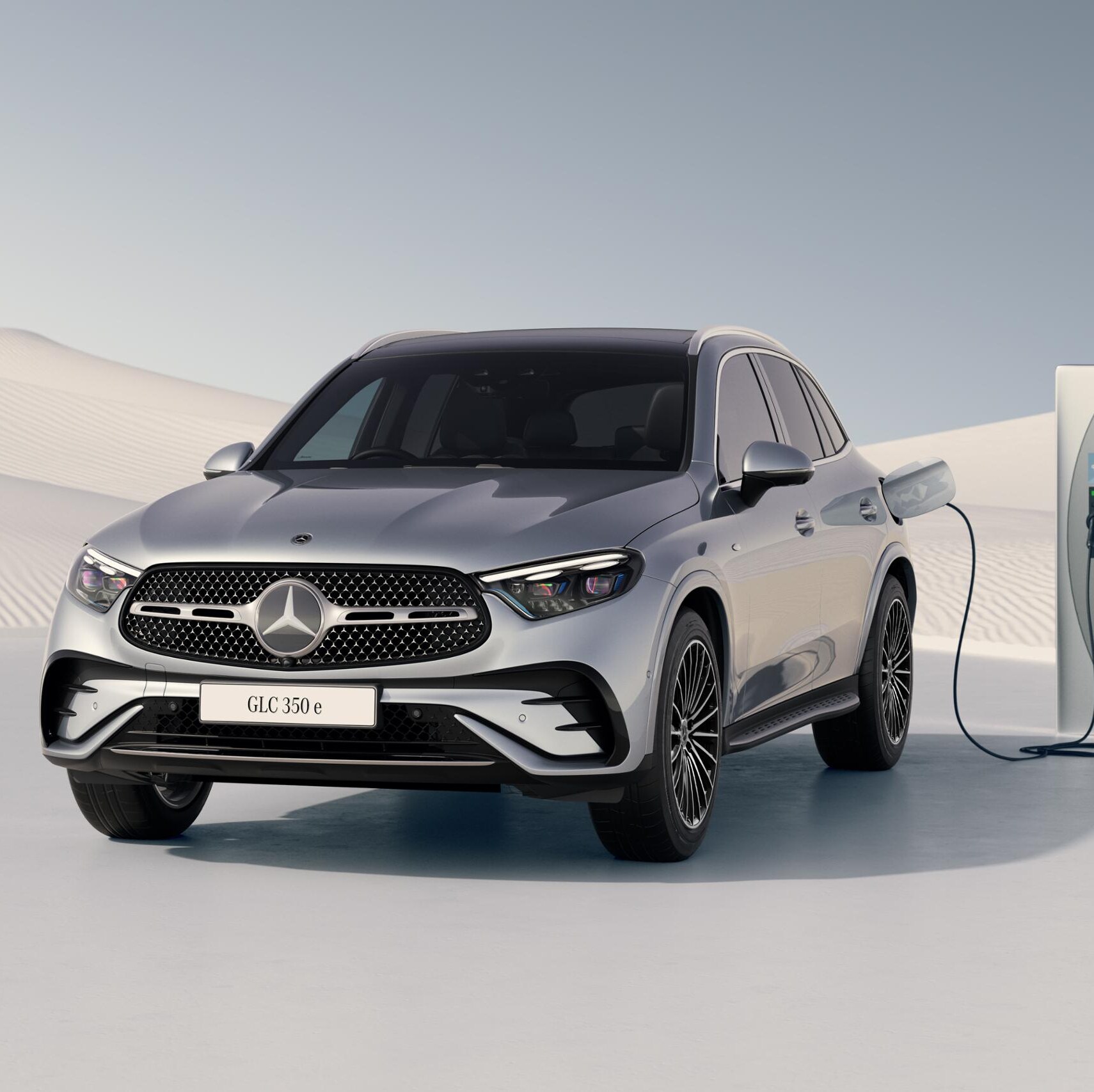 The GLC 350 e 4MATIC charging at a charging station